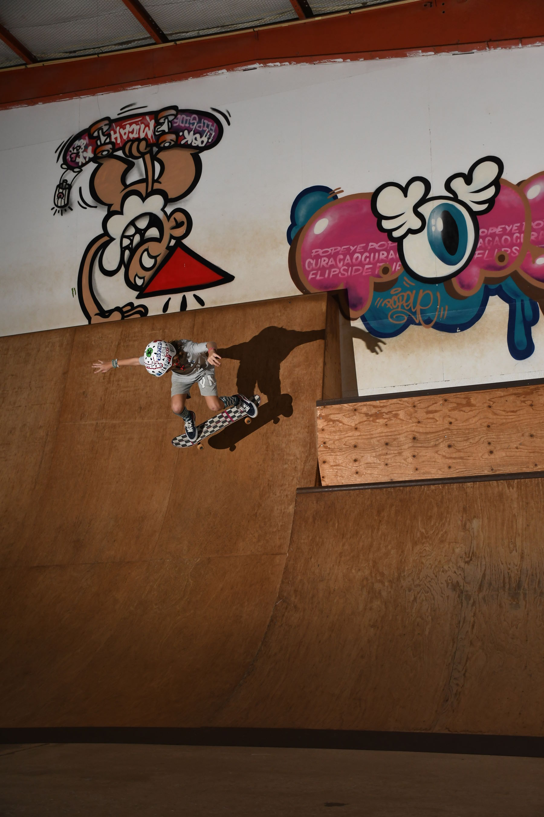 handsome young man riding skateboard